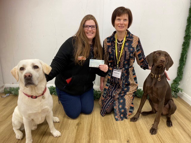 >AMANDA MISCAMPBELL HANDS OVER A CHEQUE FOR £14,299.24 TO MEDICAL DETECTION DOGS